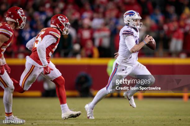 Buffalo Bills quarterback Josh Allen runs the ball during the AFC Divisional Round playoff game against the Kansas City Chiefs on January 23rd, 2022...
