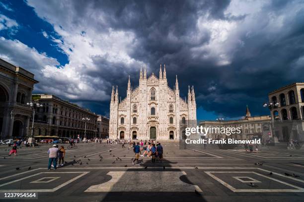 View of the facade of the Milan cathedral, Duomo di Milano, seen from Cathedral Square, Piazza del Duomo.