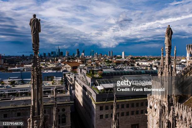 View from the rooftop of Milan cathedral, Duomo di Milano to the suburb of Porta Nuova with its modern architecture.