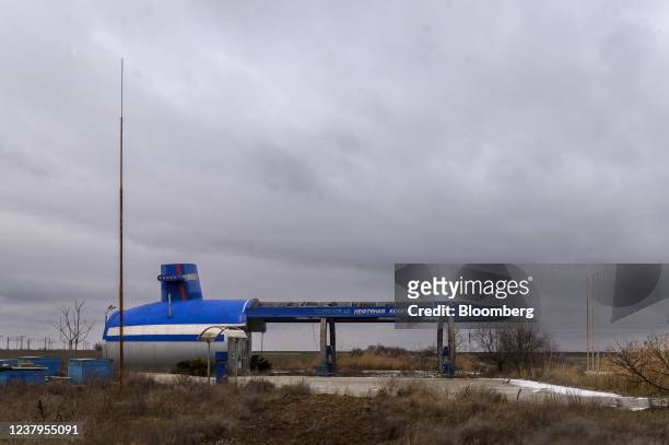 Dilapidated gas station on a deserted road to Crimea in the Henicheskyi region of Kherson Oblast, Ukraine, on Wednesday, Jan. 19, 2022. President Joe...
