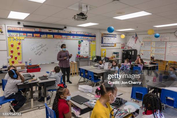Nicole Brown, a second grade teacher, starts class at Carter Traditional Elementary School on January 24, 2022 in Louisville, Kentucky. Students in...
