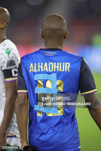 Comoros' Chaker Alhadhur made a number 3 with tape on his jersey during the Africa Cup of Nations 2021 round of 16 football match between Cameroon...