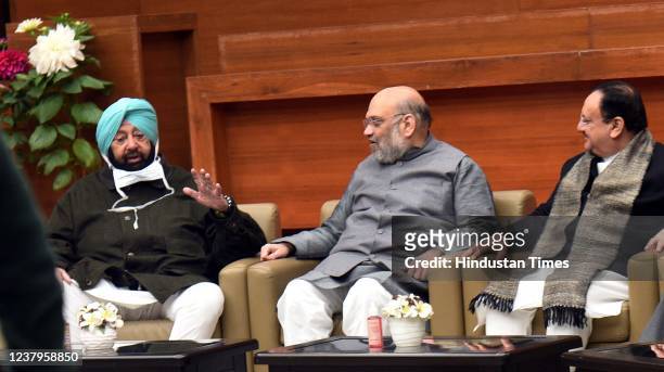 Union Home Minister Amit Shah with Punjab Lok Congress party leader Captain Amarinder Singh and BJP President JP Nadda during a meeting at BJP...