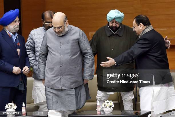 Union Home Minister Amit Shah with Punjab Lok Congress party leader Captain Amarinder Singh and BJP President JP Nadda during a meeting at BJP...