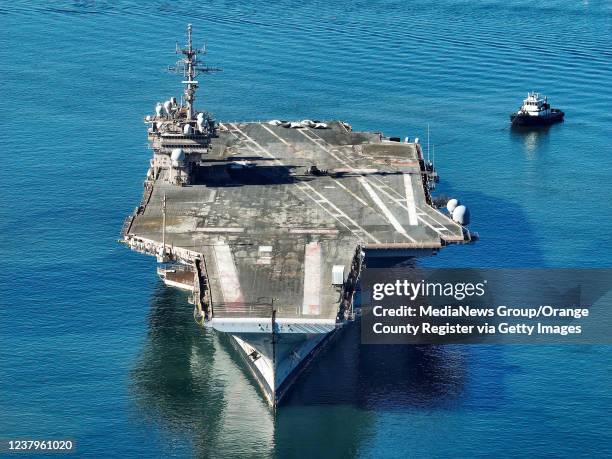 Long Beach, CA The former aircraft carrier Kitty Hawk sits off the coast of Long Beach, CA, on the way from Bremerton, WA, to a Texas ship-breaking...