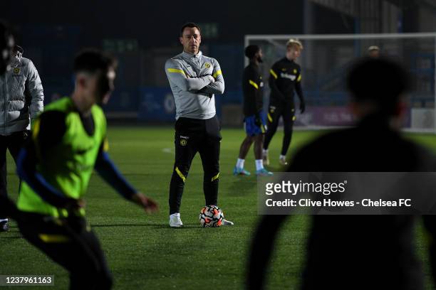 John Terry of Chelsea watches the players during the warm up prior to the Chelsea v Manchester City Premier League 2 match at Kingsmeadow on January...