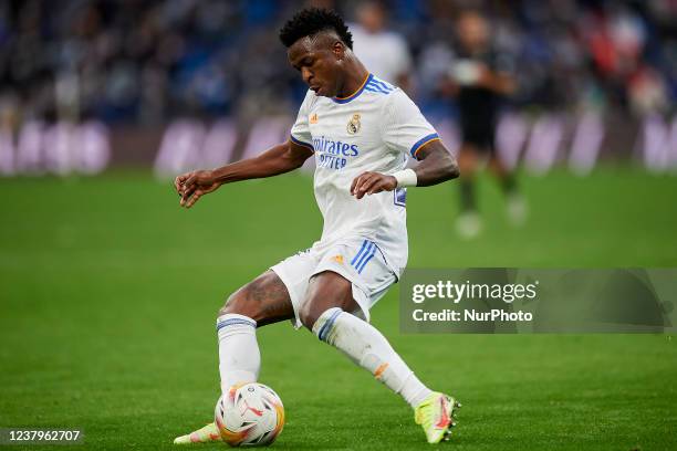 Vinicius Junior of Real Madrid in action during the La Liga Santander match between Real Madrid CF and Elche CF at Estadio Santiago Bernabeu on...