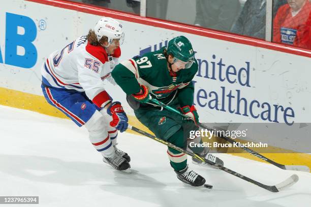 Michael Pezzetta of the Montreal Canadiens defends Kirill Kaprizov of the Minnesota Wild during the game at the Xcel Energy Center on January 24,...