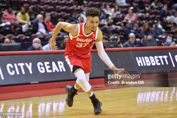 Reggie Hearn of the Memphis Hustle dribbles the ball during an NBA G-League game against the South Bay Lakers on January 24, 2022 at Landers Center...