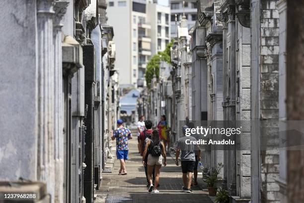 People visit Recoleta Cemetery containing the graves of notable people, including Eva Peron, presidents of Argentina, Nobel Prize winners, the...