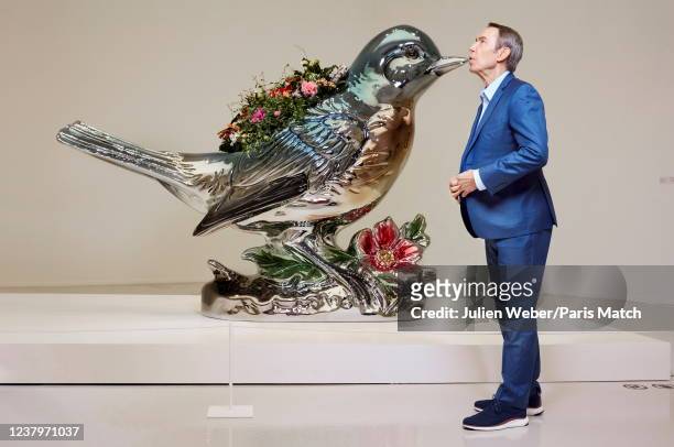 Artist Jeff Koons is photographed for Paris Match with "Bluebird plantes" on show at the Al Riwak gallery on November 22, 2021 in Doha, Quatar.