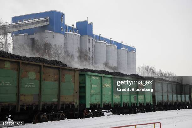 Hot coke in freight wagons ahead of shipping at the Moscow coke and gas plant, operated by Mechel PJSC, in Vidnoye, near Moscow, Russia, on Monday,...