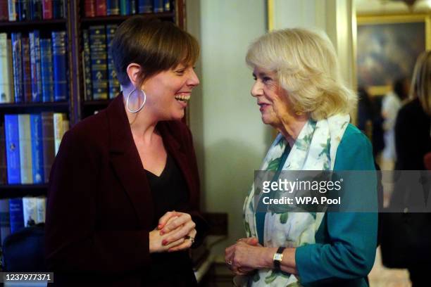 Camilla, Duchess of Cornwall talks with Jess Phillips MP during a reception at Clarence House in London to mark 50 years of Refuge on January 25,...