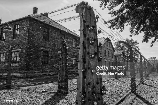 Barb wired fences and builings at the former Nazi German Auschwitz I concentration camp at Auschwitz Memorial Site. Oswiecim, Poland on October 4,...