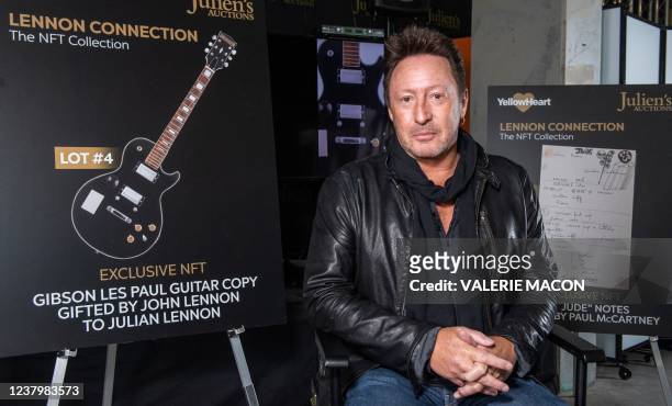 Artist/musician Julian Lennon poses in front of the NFT part of "Lennon Connection: The NFT Collection" auction featuring cherished Beatles and John...