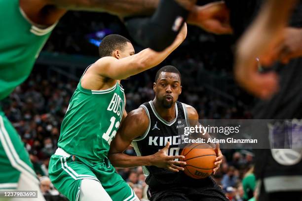 Harrison Barnes of the Sacramento Kings goes to the basket while guarded by Grant Williams of the Boston Celtics during a game at TD Garden on...