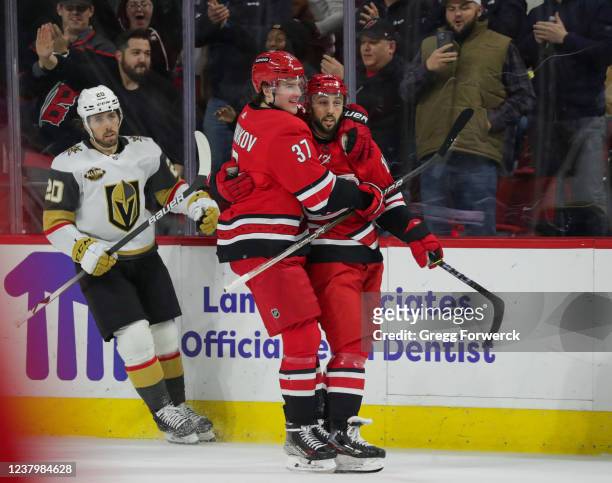 Vincent Trocheck of the Carolina Hurricanes celebrates his goal with teammate Andrei Svechnikov who assisted on the goal during the second period of...