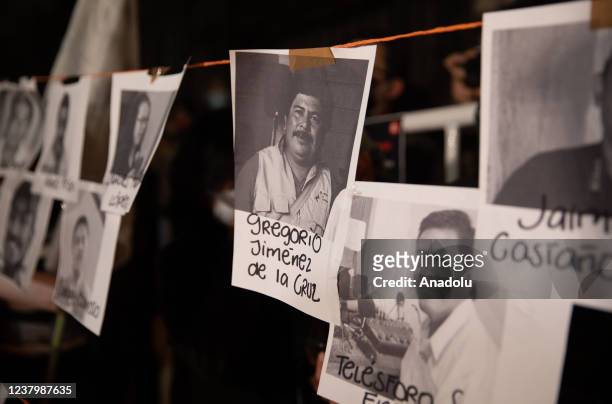 Photos of murdered journalists were placed during a protest to demand justice, in front of the Interior Ministry Office, in Mexico City, Mexico on...
