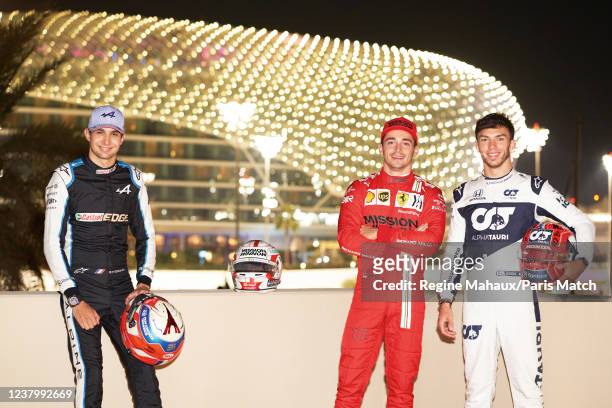 Formula One racing drivers Esteban Ocon, Charles Leclerc and Pierre Gasly are photographed for Paris Match on December 9, 2021 in Abu Dhabi, Saudi...
