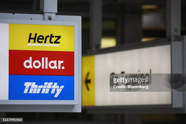 Hertz, Dollar, and Thrifty signage at the Louisville International Airport in Louisville, Kentucky, U.S., on Thursday, Jan. 20, 2022. The U.S. Car...