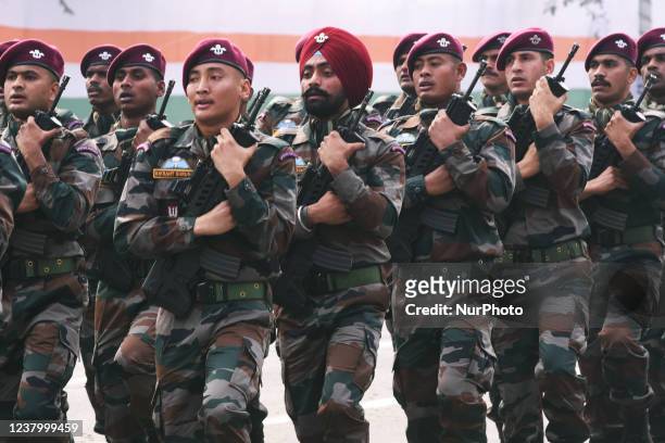 Indian army's paratrooper special force soldiers march past during the Republic Day parade in Kolkata on January 26, 2022.