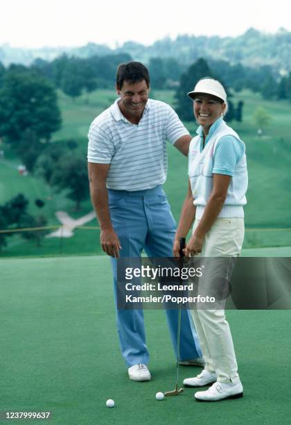 American professional golfer Cindy Rarick with her caddy and husband, Rick, circa 1986.