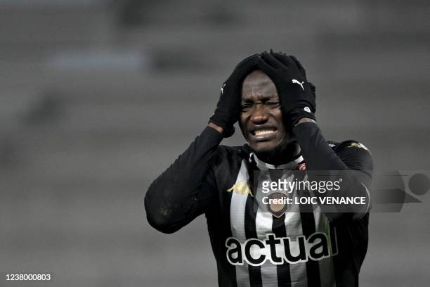 Angers' Chadian forward Casimir Ninga reacts during the French L1 football match between SCO Angers and AS Saint-Etienne at the Raymond Kopa Stadium...