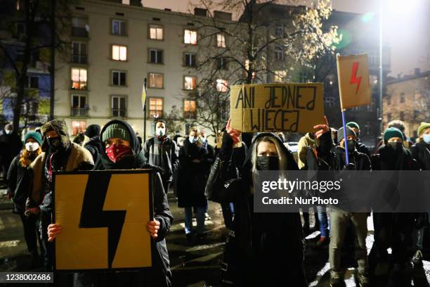 People protest in front of the Law and Justice ruling party office, attending demonstration against the abortion ban. Krakow, Poland on January 26,...