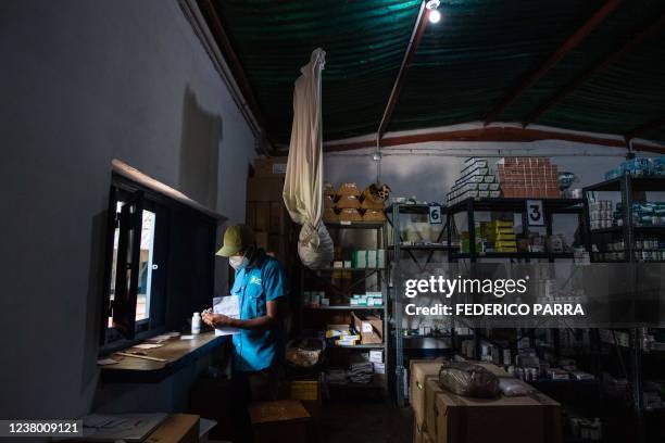 Health care worker works in the pharmacy of the rural outpatient clinic "La Milagrosa" in the Maniapure sector of the Bolivar State, 595 km southeast...