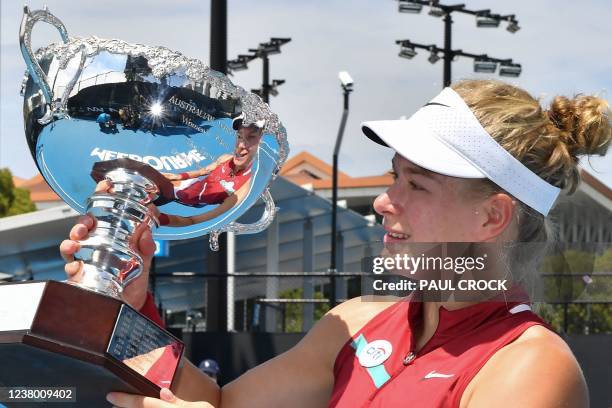 Netherlands' Diede de Groot poses with the trophy after winning against Netherlands' Aniek van Koot during their women's wheelchair singles final...