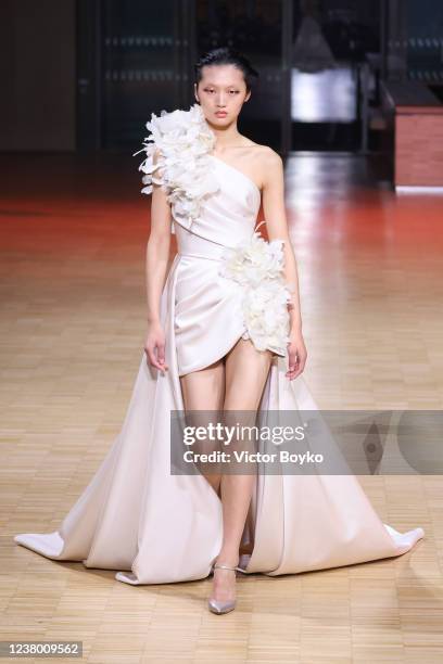 Model walks the runway during the Elie Saab Haute Couture Spring/Summer 2022 show as part of Paris Fashion Week on January 26, 2022 in Paris, France.