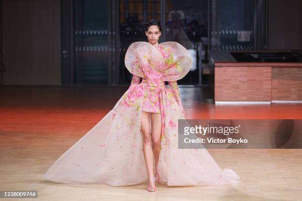 Model walks the runway during the Elie Saab Haute Couture Spring/Summer 2022 show as part of Paris Fashion Week on January 26, 2022 in Paris, France.