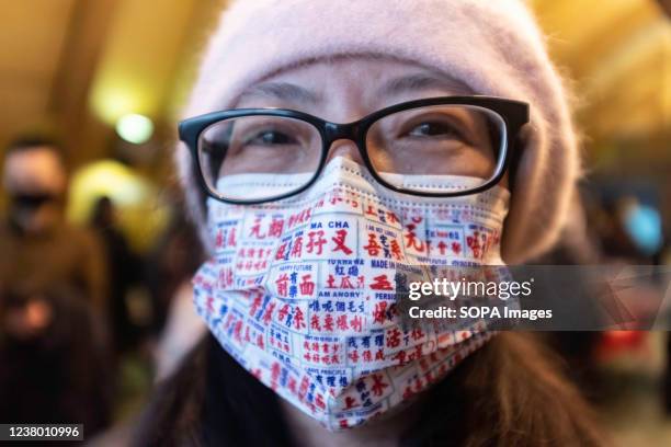 Lady wears a Hong Kong mask during the Hong Kong 181th birthday. Museum of Hong Kong hosts the celebration on the Hong Kong 181th birthday in the...