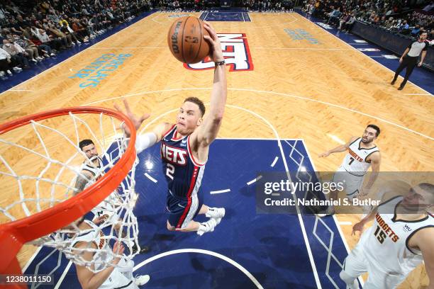 Blake Griffin of the Brooklyn Nets dunks the ball during the game against the Denver Nuggets on January 26, 2022 at Barclays Center in Brooklyn, New...