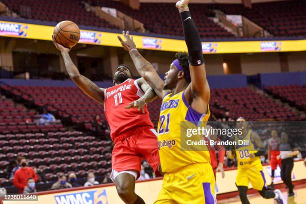 Shaq Buchanan of the Memphis Hustle shoots against Cameron Oliver of the South Bay Lakers during an NBA G-League game on January 26, 2022 at Landers...