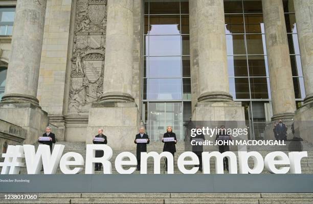 German Federal Constitutional Court President Stephan Harbarth, German Chancellor Olaf Scholz, the Speaker of Israel's Knesset parliament Mickey...