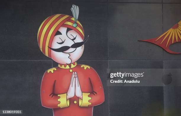 The mascot of India's flagship carrier Air India- 'Maharaja' displayed outside the Airlines building in New Delhi, India on January 27 as the Indian...