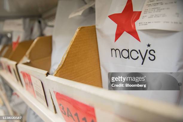 Packages at the Macy's flagship store in New York, U.S., on Thursday, Jan. 6, 2022. Macy's Inc. Is transforming the world's largest department store...