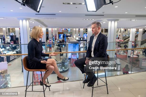 Jeff Gennette, chief executive officer of Macy's Inc., right, speaks during a Bloomberg Television interview at the company's flagship store in New...