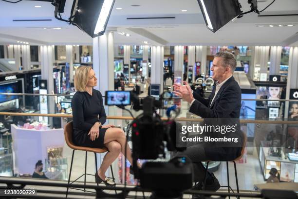 Jeff Gennette, chief executive officer of Macy's Inc., right, speaks during a Bloomberg Television interview at the company's flagship store in New...
