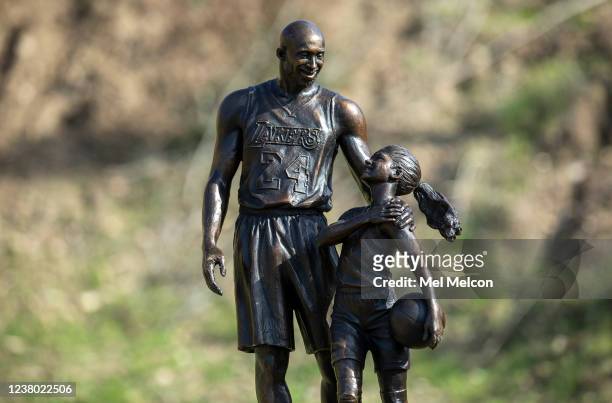Bronze statue of Los Angeles Lakers legend Kobe Bryant and his daughter Gianna by sculptor Dan Medina of West Hills is is placed at the helicopter...