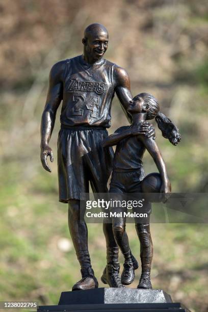 Bronze statue of Los Angeles Lakers legend Kobe Bryant and his daughter Gianna by sculptor Dan Medina of West Hills is is placed at the helicopter...