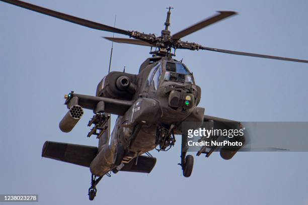 Boeing AH-64 Apache helicopter from the Greek Army as seen flying and manoeuvering during a flying display demonstration during Athens Flying Week...