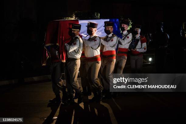 French Army 54th artillery regiment soldiers carry the coffin of French brigadier-chief Alexandre Martin killed in Mali by a mortar shells attack of...