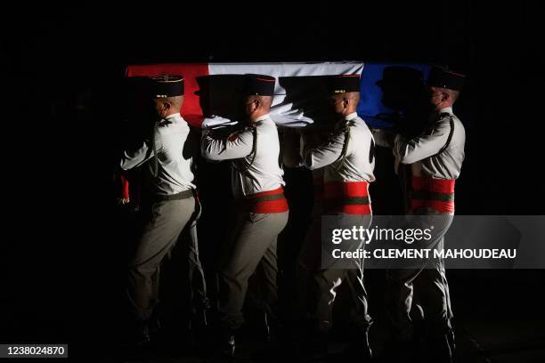 French Army 54th artillery regiment soldiers carry the coffin of French brigadier-chief Alexandre Martin killed in Mali by a mortar shells attack of...