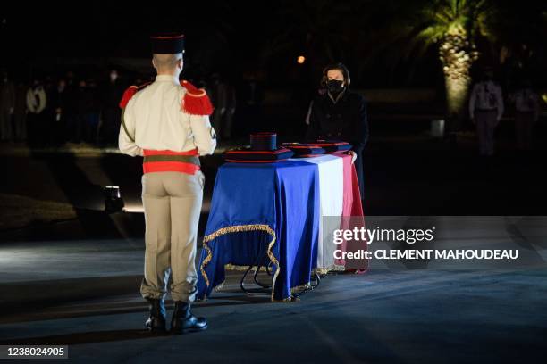 France's Defence Minister Florence Parly pays tribute in front of the coffin of French brigadier-chief Alexandre Martin killed in Mali by a mortar...