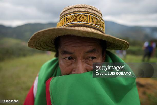 Colombian indigenous man attends the funeral of Jose Albeiro Camayo - killed by FARC dissidents on January 24, 2022 - a leader of the indigenous...