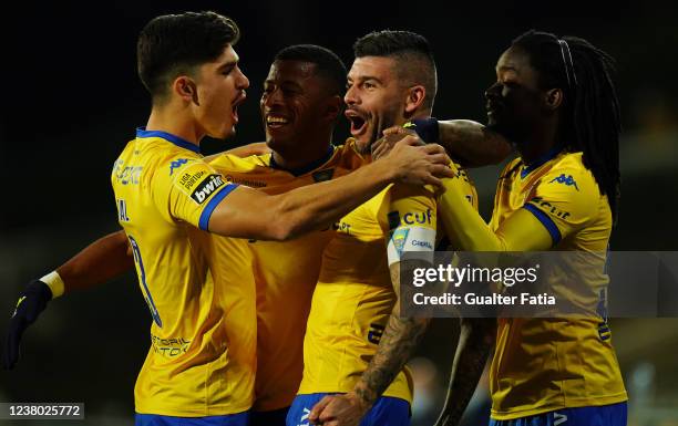 Joaozinho of GD Estoril Praia celebrates celebrates with teammates after a goal during the Liga Bwin match between GD Estoril Praia and FC Arouca at...