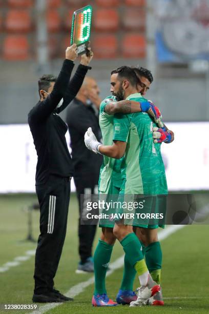 Chile's goalkeeper Claudio Bravo leaves the field after an injury during the South American qualification football match for the FIFA World Cup Qatar...