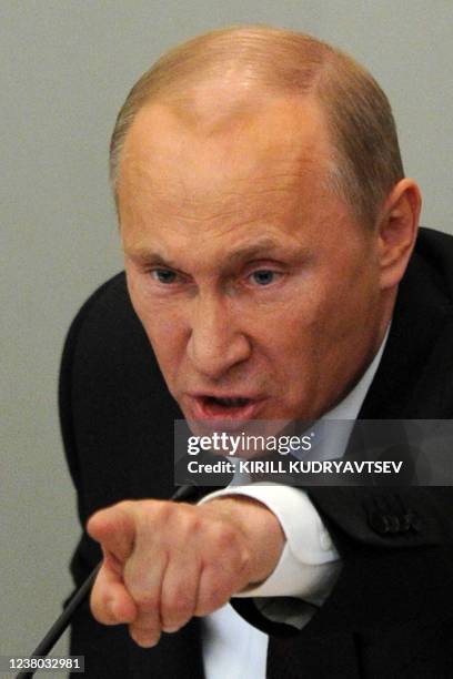 Russia's Prime Minister and President-elect Vladimir Putin speaks in the State Duma lower house of parliament, in Moscow, on April 11, 2012. Deputies...